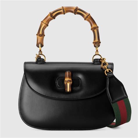 borsa a mano in rettile gucci|Borsa a mano Gucci Bamboo 1947.